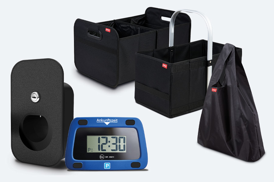 schwarze Achilles Autofaltbox, Handlebox, Tragetasche, Kabelorganiser und blauer Parkwächter