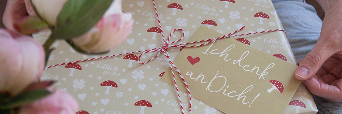 Wir verpacken dein Glück gleich mit.