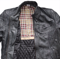 Transform your style with the ultimate fashion statement: a men’s leather jacket crafted from premium Lamb Nappa leather. This sleek black jacket provides unmatched comfort and sophistication. Designed by German Wear