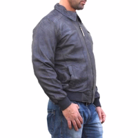Side view of a men's sleek leather jacket featuring a full front zipper, a kent collar, and a single-color design. The jacket is crafted from smooth Polyester with a comfortable polyester lining.