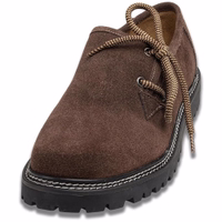 Front view of stylish haferl shoes featuring a block heel and rubber sole. The elegant design includes soft, 100% suede leather and an inner soft leather lining. Lace-up closure completes the look, perfect for a carnival celebration.