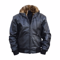 Men's black sheepskin fashion jacket is displayed from the front, featuring one pocket at chest level on each side. It is buttoned up on the front for a stylish and secure fit.