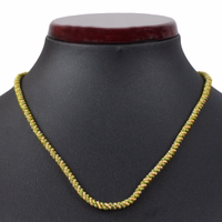 Vorderansicht mit schwarzer Statue German Wear Traditional Cord Chain Pendant gefertigt aus gold und grün gedrehter Metallkordel ideal für deutsche und bayerische Trachtenschmuck Looks jetzt online bestellen