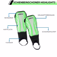 Green shin pads feature detail, close-up on pre-shaped foam interior, improved ventilation, and strong ankle protection.