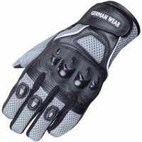 Rüsten Sie Ihre Ausrüstung mit grauen Motorradhandschuhen auf. Mit Thinsulate-Fasern, Knöchelschutz und Klettverschluss am Handgelenk bieten diese Handschuhe Komfort und Langlebigkeit. Perfekt für Sommerfahrten.