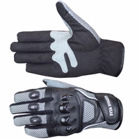 Bleiben Sie mit Bikerhandschuhen komfortabel und geschützt. Aus hochwertigem Textil mit Ledereinsätzen gefertigt, bieten diese grauen Handschuhe Thinsulate-Isolierung, Knöchelschutz und verstellbare Handgelenke. Ideal für Motocross.