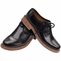 A pair of men's Bavarian traditional shoes crafted from the finest cowhide leather. These durable shoes feature a shoelace closure and an elegant yet simple design, complete with a leather sole and a short shaft for a classic look.