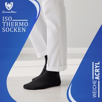 6er-Pack ISOSocken, extra warme Winter-Thermosocken in Schwarz für Herren Damen GermanWear-Label an Thermosocken, Verpackung teilweise sichtbar, deutscher Text lesbar