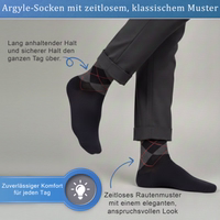 Blue business dress socks with argyle pattern, lying flat, German text visible on packaging