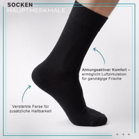 Close-up of a black business formal sock, cuff and toe area visible, text visible