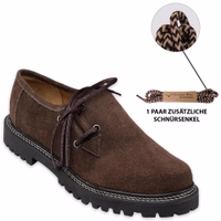 A close-up of haferl shoes from the front, showcasing their traditional design in chestnut brown. These handmade, welted shoes feature a lace-up closure and a soft leather interior. The block heel adds a touch of classic style.