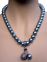 German Wear Traditional Women’s Costume Necklace German Wear Traditional Women’s Costume Necklace with turquoise, blue, and gray imitation pearls, featuring removable charms for Oktoberfest and folk outfits, nickel-free, buy online now.